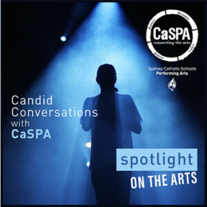 image of person singing under spotlight