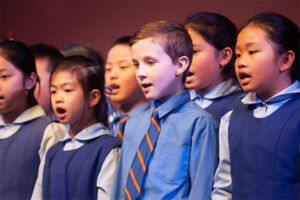students in primary school singing
