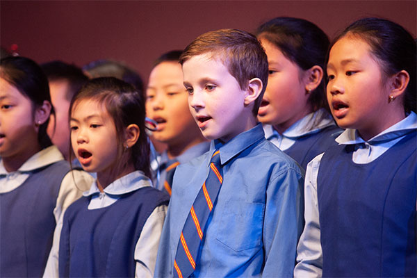 students in primary school singing